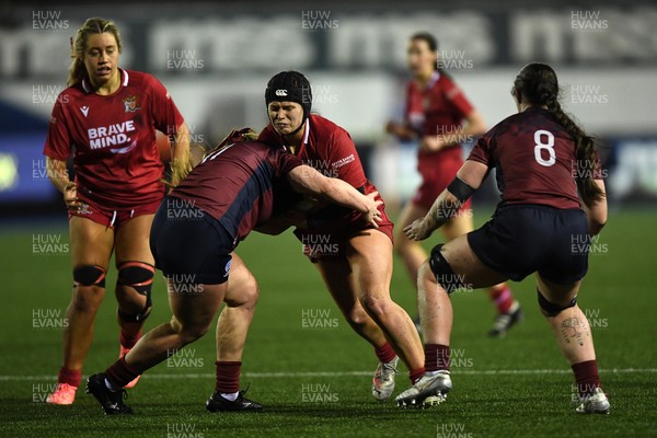 031225 - Cardiff Uni Women v Cardiff Met Women - Cardiff Clash - Evie Guy of Cardiff Uni is challenged by Libby Naughton of Cardiff Met