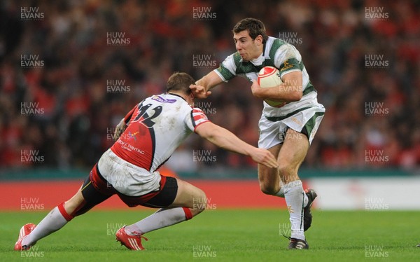 30.03.11 - Cardiff University v Swansea University - Welsh Varsity 2011 - Mike Jones of Swansea University is tackled by Ross Wardle of Cardiff University. 