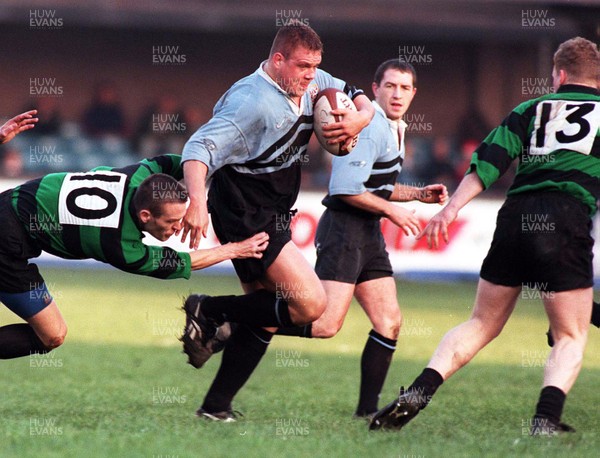 201297 - Cardiff RFC v Abercarn - Spencer John of Cardiff breaks past Steve Cheshire