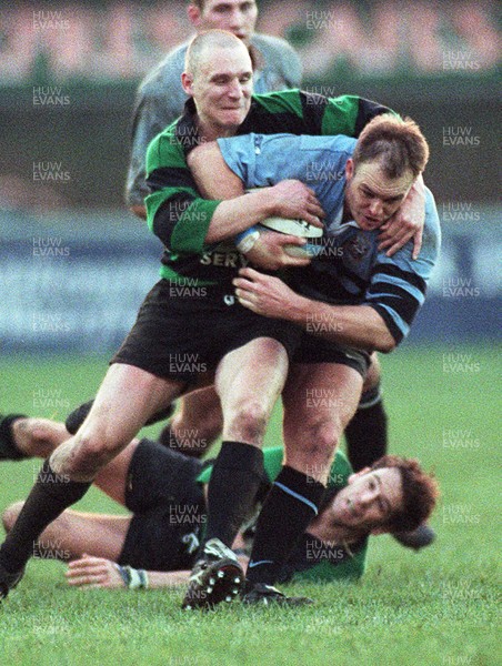 201297 - Cardiff RFC v Abercarn - Mike Hall of Cardiff is tackled by Steve Barnes