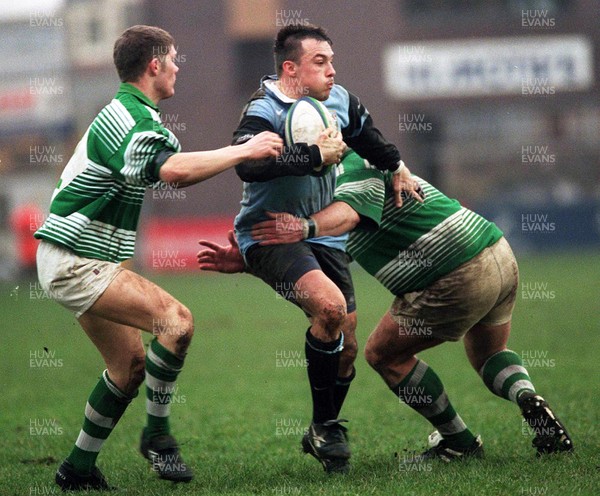 300199 - Cardiff v Abertillery - Simon Hill of Cardiff is stopped by the Abertillery defence 