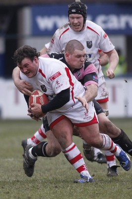 06.03.10 Cardiff RFC v Ayr RFC - British & Irish Cup -  Cardiff's Daniel Preece is tackled by Ayr's Gordon Reid. 