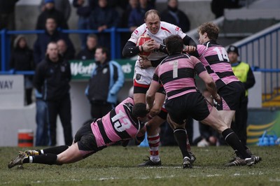 06.03.10 Cardiff RFC v Ayr RFC - British & Irish Cup -  Cardiff's Craig Morgan is wrapped up by Ayr's Ross Curle(13), Paul Burke(7) & Steven Manning. 