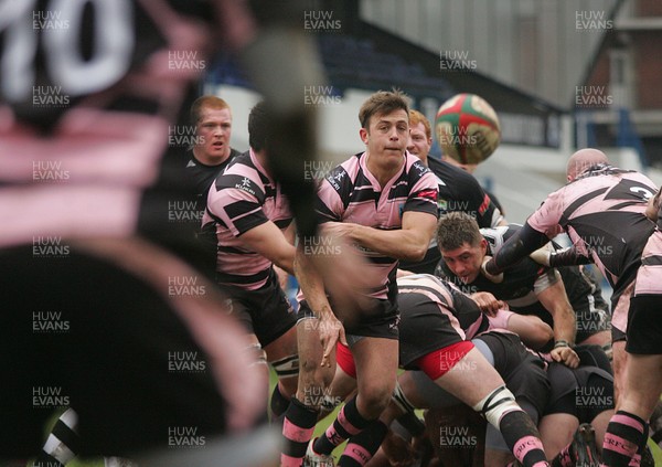 090313 Cardiff RFC v Bedwas RFC - Principality Premiership -Cardiff's Sion Hopkins gets the ball away 