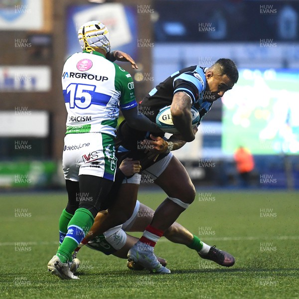 180223 - Cardiff Rugby v Benetton - United Rugby Championship - Rey Lee-Lo of Cardiff is tackled by Rhyno Smith of Benetton