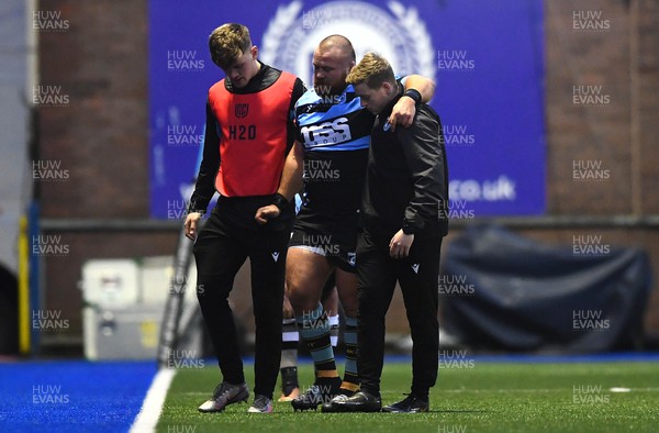 180223 - Cardiff Rugby v Benetton - United Rugby Championship - Dmitri Arhip of Cardiff is helped from the field with medical staff