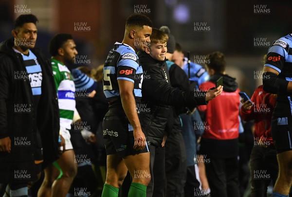 180223 - Cardiff Rugby v Benetton - United Rugby Championship - Ben Thomas of Cardiff is greeted by supporters at the ene of the game