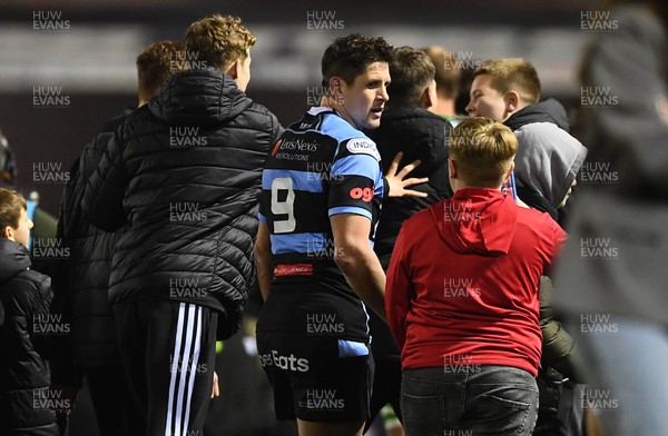 180223 - Cardiff Rugby v Benetton - United Rugby Championship - Lloyd Williams of Cardiff is greeted by supporters at the ene of the game