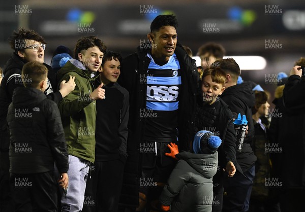 180223 - Cardiff Rugby v Benetton - United Rugby Championship - Lopeti Timani of Cardiff is greeted by supporters at the ene of the game