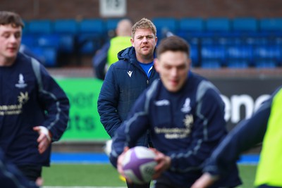 270124 - Cardiff v Bridgend - Indigo Group Premiership - Matthew Jones of Bridgend Ravens coaching team leads during the warm up 