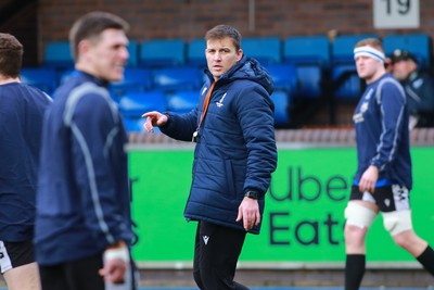 270124 - Cardiff v Bridgend - Indigo Group Premiership - Tom Smith of Bridgend Ravens coaching team leads during the warm up 