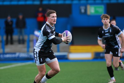 270124 - Cardiff v Bridgend - Indigo Group Premiership - Edd Howley of Bridgend Ravens attacks the open spaces