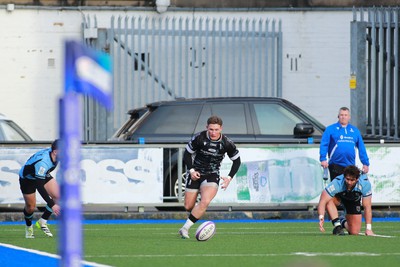 270124 - Cardiff v Bridgend - Indigo Group Premiership - Edd Howley of Bridgend Ravens pounces on a loose ball