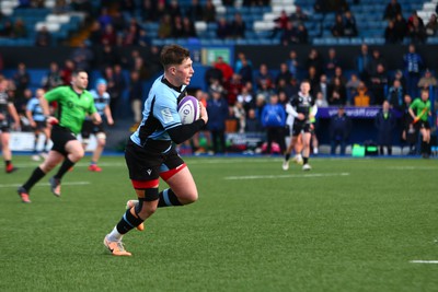 270124 - Cardiff v Bridgend - Indigo Group Premiership - Harrison James of Cardiff runs in for a try