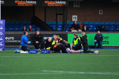 270124 - Cardiff v Bridgend - Indigo Group Premiership - Medical staff of Cardiff and Bridgend Ravens respond quickly to treat home player Joey Tomlinson