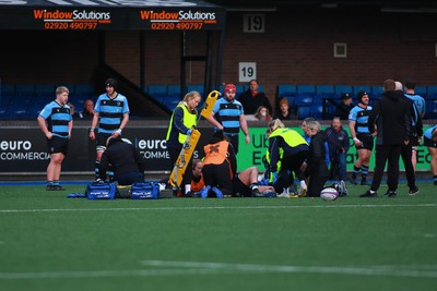 270124 - Cardiff v Bridgend - Indigo Group Premiership - Medical staff of Cardiff and Bridgend Ravens respond quickly to treat home player Joey Tomlinson