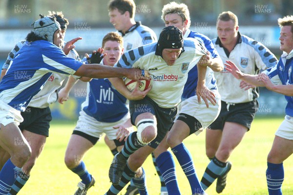 270503 - Cardiff v Bridgend - Welsh Premiership - Cardiff's Matt Allen powers past Maama Molitika