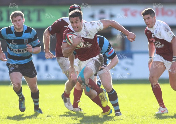 131012 Cardiff RFC v Bristol RFC - British and Irish Cup -Bristol's David McLlwaine makes a break past Cardiff's Kristian Dacey