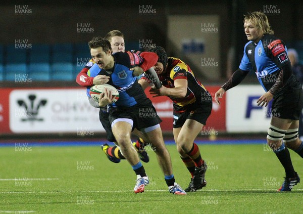 021113 Cardiff RFC v Carmarthen Quins RFC - Principality Premiership -Cardiff's Lewis Smout is tackled by Carmarthen's Chris Banfield(c) Huw Evans Agency