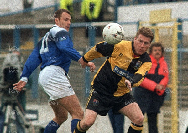 050497 - Cardiff City v  Cambridge - Jimmy Gardner of Cardiff is beaten by Paul Raynor