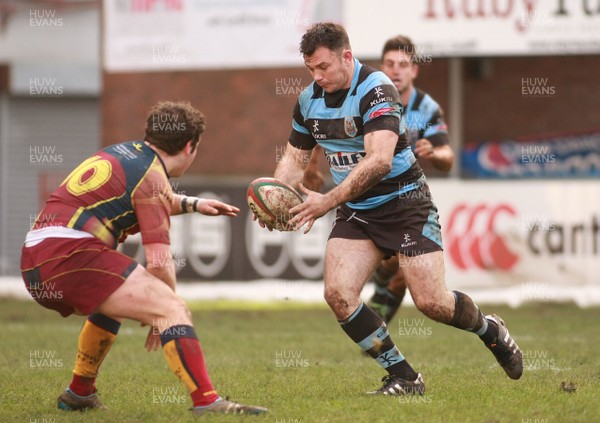 260113 Cardiff RFC v Cardiff Metropolitan RFC -Cardiff's Darren Ryan looks to clear the ball