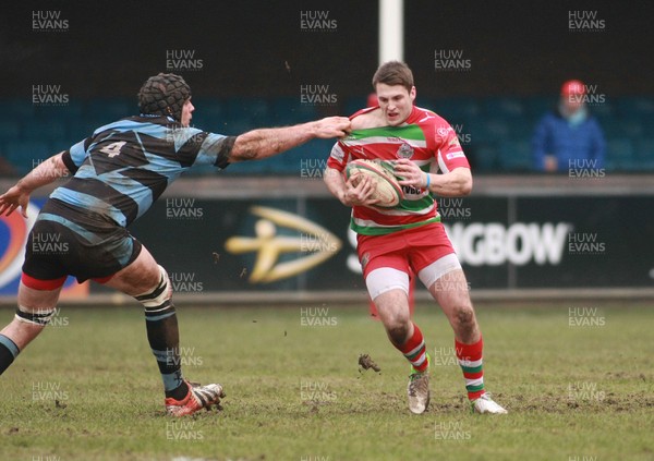 160213 Cardiff RFC v Ebbw Vale RFC - Swalec Cup -Ebbw Vale's Josh Lewis is collared by Cardiff's James Murphy 