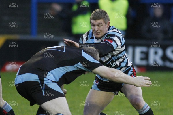 261209 - Cardiff RFC v Glamorgan Wanderers RFC - Principality Premiership - Glamorgan Wanderers' Rhys Dyer hands off Dan Partridge