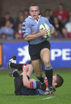 271001 - Cardiff v Glasgow - Heineken Cup - Cardiff's Rhys Williams steps out of tackle by Alan Bulloch