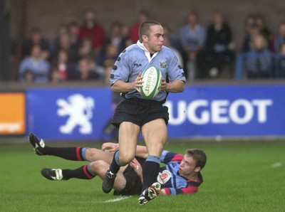 271001 - Cardiff v Glasgow - Heineken Cup - Cardiff's Rhys Williams steps out of tackle by Alan Bulloch