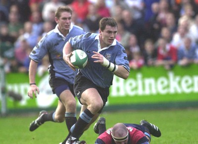 271001 - Cardiff v Glasgow - Heineken Cup - Cardiff's Iestyn Harris holds off Gordon McIlwham to score second try of game