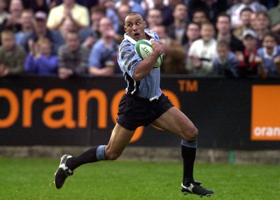 271001 - Cardiff v Glasgow - Heineken Cup - Cardiff's Anthony Sullivan leaves the field behind as he romps in for his second try