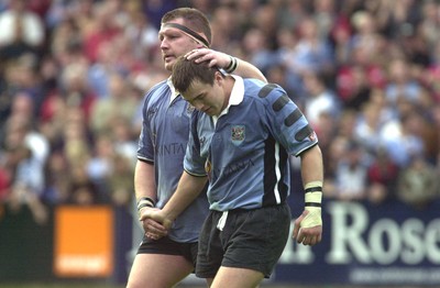 271001 - Cardiff v Glasgow - Heineken Cup - Cardiff's Iestyn Harris gets the seal of approval from his Captain Dai Young on his hat trick try performance