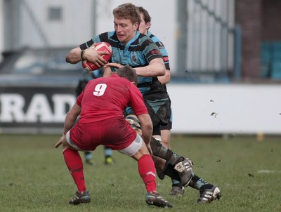 180212 Cardiff RFC v Llanelli RFC - Swalec Cup -Cardiff's Macauley Cook takes on Llanelli's Justin James