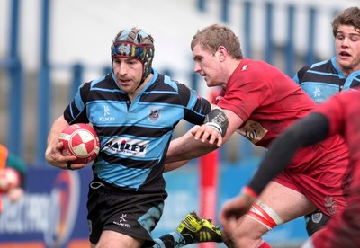 180212 Cardiff RFC v Llanelli RFC - Swalec Cup -Cardiff's Shaun Powell outpaces Llanelli's Craig Price