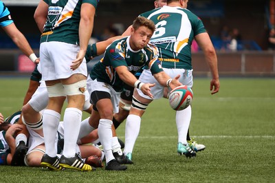 010918 - Cardiff RFC v Merthyr RFC - Principality Premiership - Justin James of  Merthyr gets the ball away 