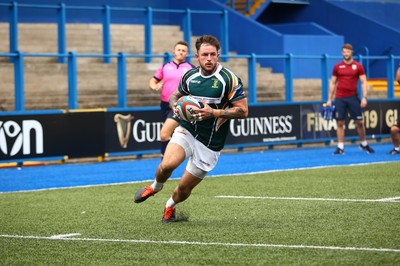 010918 - Cardiff RFC v Merthyr RFC - Principality Premiership - Kyle Evans of Merthyr crosses to score a try