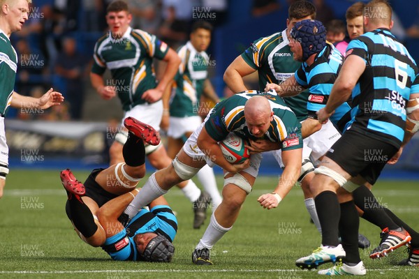 010918 - Cardiff RFC v Merthyr RFC - Principality Premiership - Phil Rees of Merthyr is tackled by Tom Daley and James Murphy of Cardiff