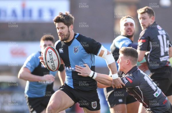 300116 - Cardiff RFC v Neath RFC - Principality Premiership -Ceri Young of Cardiff beats Ed Howley of Neath