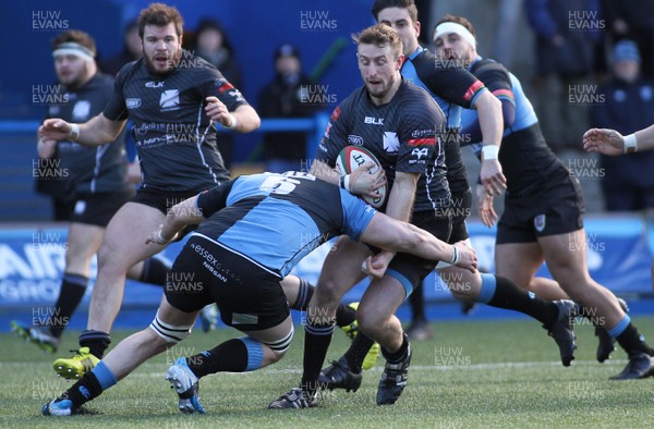 300116 - Cardiff RFC v Neath RFC - Principality Premiership -Alec Jenkins of Neath is tackled by Nick White of Cardiff