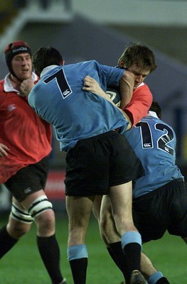 050405 Cardiff vs Newbridge Welsh Premier  LeagueELgan Jones is wrapped up by Newbridge's Tom Lampert(7) & Chris WellsDarren Griffiths/