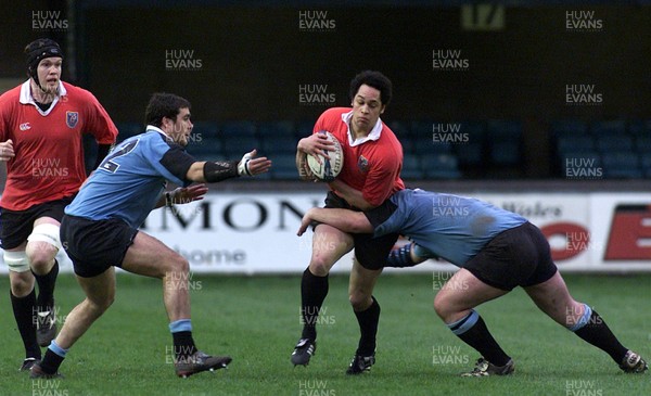 050405 Cardiff vs Newbridge Welsh Premier  LeagueLeon Andrews is caught by M Mills as Chris Wells closes in Darren Griffiths/