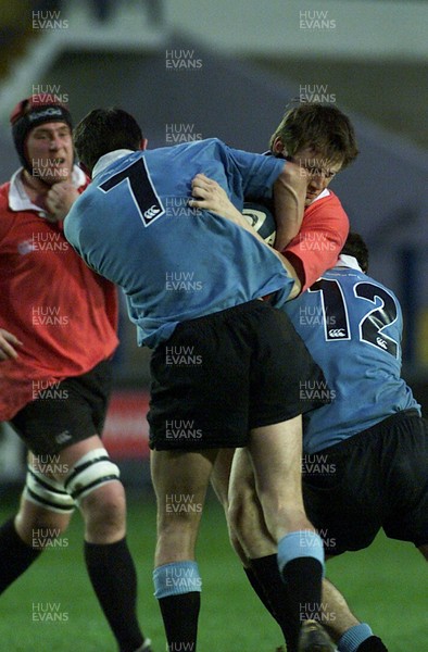 050405 Cardiff vs Newbridge Welsh Premier  LeagueELgan Jones is wrapped up by Newbridge's Tom Lampert(7) & Chris WellsDarren Griffiths/