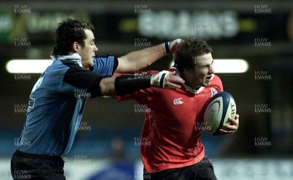 050405 Cardiff vs Newbridge Welsh Premier  LeagueRichard Jones attempts to hand off Chris WellsDarren Griffiths/