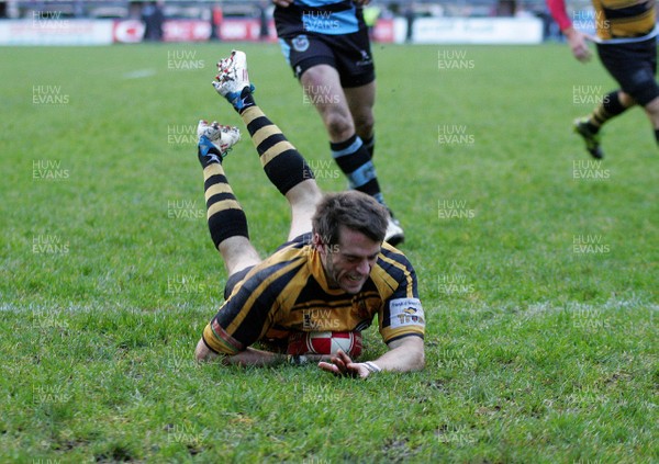 02.01.12 Cardiff RFC v Newport RFC - Principality Premiership - Newport's Elliot Frewen dives in to score 