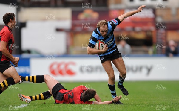 150912 - Cardiff v Newport - Principality Premiership -Steve Cullen of Cardiff is tackled by Will Hodnett of Newport