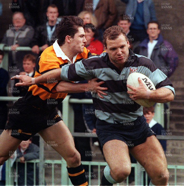 170493 - Cardiff 36 v 20 Newport -  Colin Laity of Cardiff beats the tackle of Andrew Lewis to score a try 