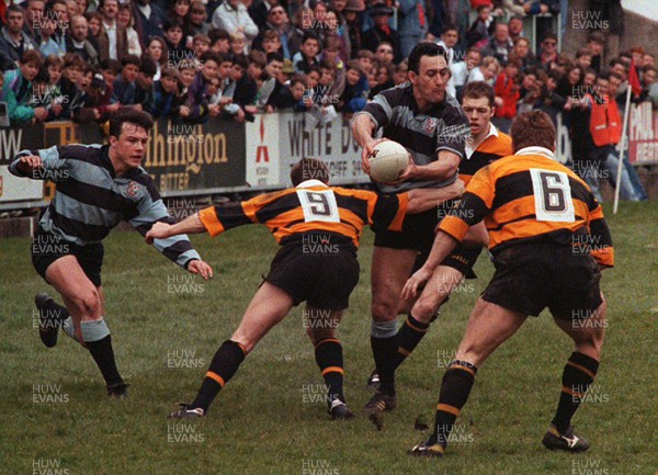 170493 - Cardiff 36 v 20 Newport -  Hemi Taylor of Cardiff is tackled by David Llewellyn 