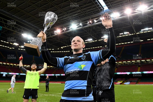 230423 - Cardiff v Newport - WRU Premiership Cup Final - Dan Fish of Cardiff lifts the trophy