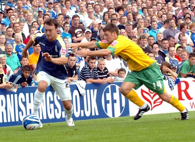 23.08.08 - Championship Football Cardiff City v Norwich City Cardiff's Darcy Blake is challenged by Norwich's Wesley Hoolahan 