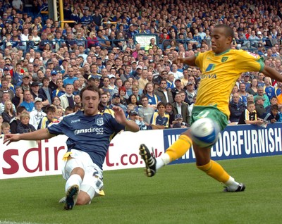 23.08.08 - Championship Football Cardiff City v Norwich City Cardiff's Darcy Blake gets the ball past Norwich's Luke Chadwick 